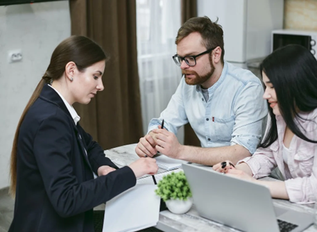 Picture of people discussing financial freedom.